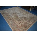 A LARGE MODERN CREAM GROUND RUG, 311cm x 243cm (sd)