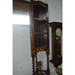 AN EARLY 20TH CENTURY OAK OPEN CORNER CUPBOARD together with another oak corner cupboard (2)