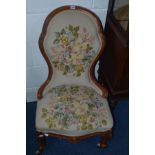 A VICTORIAN WALNUT NEEDLEWORK SPOON BACK CHAIR