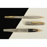 A SHEAFFER AND RETRACTABLE PENSIL SET, the fountain pen nib stamped 14k, both cases with engraved