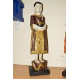 A MODERN HARDWOOD CARVED AND PAINTED DEITY, approximate height 69cm, including black painted plinth,