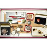 A SELECTION OF ITEMS, to include two watch cases, a filigree flower brooch, a pair of cufflinks, a