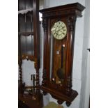 A LATE VICTORIAN MAHOGANY VIENNA WALL CLOCK with Roman numerals, height 110cm