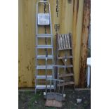 A SET OF ALUMINIUM STEP LADDERS, together with a set of wooden step ladders and a metal sack