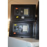 A PAIR OF BLACK DIGITAL SAFES and one other safe (keys) (3) (The contents of this lot comes from The