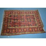 A 20TH CENTURY WOOLLEN SEYCHOUR STYLE RED AND BLACK GROUND RUG, 207cm x 151cm together with