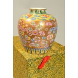 A BOXED CHINESE VASE, enamelled floral and Dragons detailing on yellow and gilt ground, orange