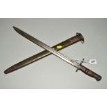 A WWI ERA 1913 PATTERN REMINGTON US ARMY RIFLE BAYONET AND SCABBARD, bayonet has the circular