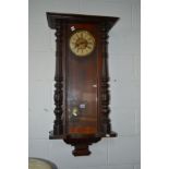 A VICTORIAN WALNUT VIENNA WALL CLOCK (sd, loose parts, losses)