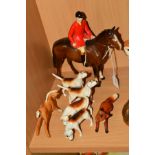 A BESWICK HUNTSMAN No9501, STYLE TWO, BROWN, FOUR Beswick Fox Hounds No2262 (x2) and No2264 (x2),