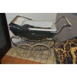 A VINTAGE SILVER CROSS PRAM