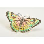 A PLIQUE-A-JOUR BROOCH, of a butterfly design with red, yellow and green plique-a-jour wings,