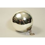 A SILVER COLOURED WITCHES BALL