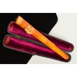 A CASED LATE 19TH CENTURY MEERSCHUM AND NATURAL AMBER CHEROOT/PIPE, designed as a natural amber