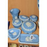 SEVEN WEDGWOOD BLUE JASPERWARE TRINKETS, comprising four covered, a vase and two other trinkets (7)