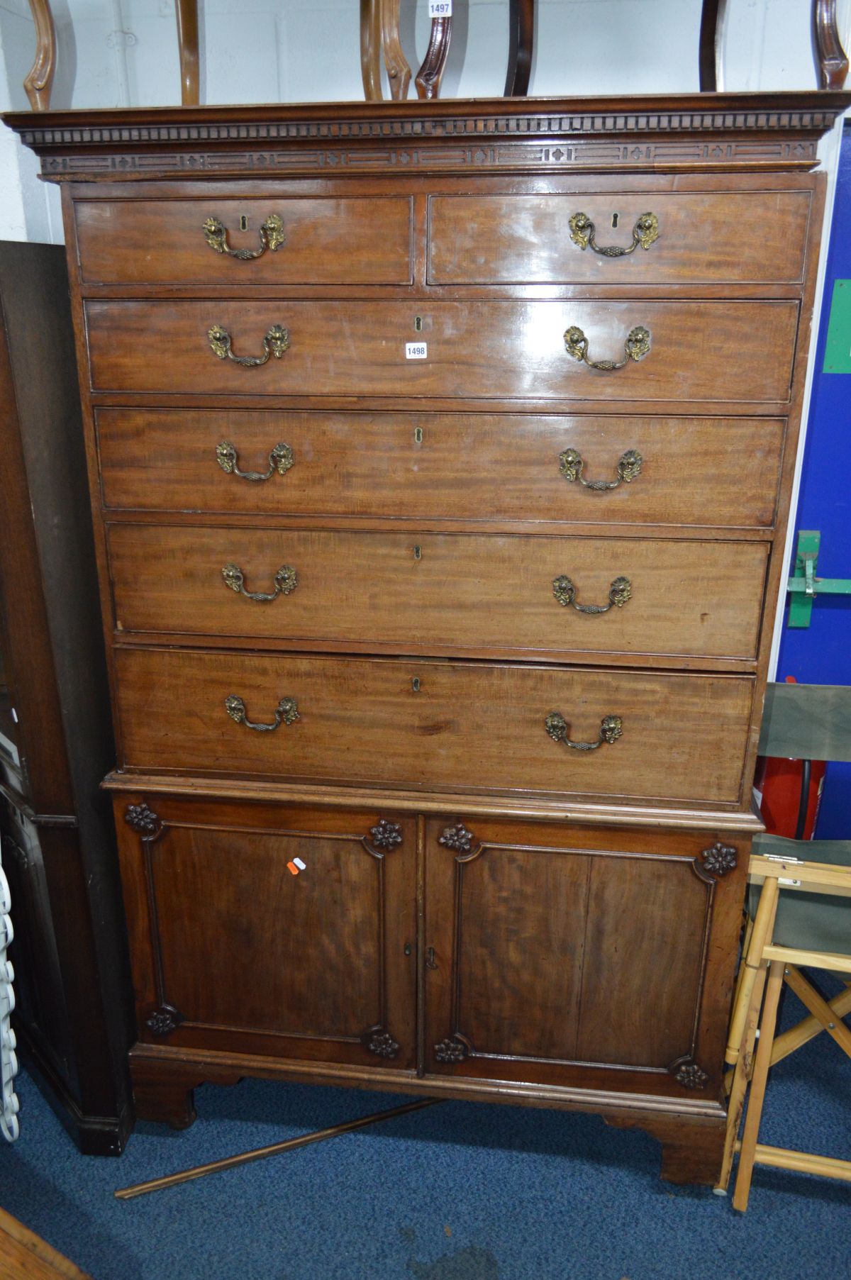 A GEORGIAN MAHOGANY SECRETAIRE CHEST ON CUPBOARD, the top section has two short over four