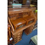 A MODERN LIGHT OAK ROLL TOP DESK with drawers to each pedestal and six internal drawers, width 126cm