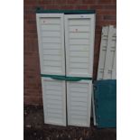 A CREAM AND GREEN OUTDOOR TWO DOOR STORAGE UNIT, height 176cm x width 75cm x depth 50cm