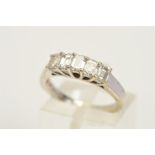 AN 18CT WHITE GOLD DIAMOND RING, set with five emerald cut diamonds within shared four claw settings