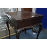 A LATE VICTORIAN MAHOGANY ENVELOPE CARD TABLE, green baize interior and copper ash trays to each