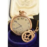 AN EARLY 20TH CENTURY 9CT GOLD OPEN FACED POCKET WATCH, with an attached ribbon and Masonic fob,