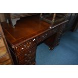 A MODERN MAHOGANY PEDESTAL DESK, with crossbanded inlays to top and drawer fronts and Ogee bracket