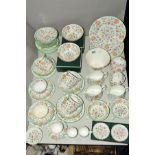 A MINTON 'HADDON HALL' TEA SERVICE, including five plates measuring 23cm diameter, fourteen side