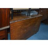 A GEORGIAN MAHOGANY GATE LEG TABLE (The content of this lot comes from The Abbots Bromley School)