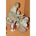 TWO LLADRO FIGURE GROUPS AND A ROYAL CROWN DERBY PAPERWEIGHT 'Caressing the Calf' No4287, by
