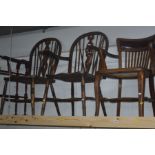 AN EARLY TO MID 20TH CENTURY OAK ELBOW CHAIR with burgundy buttoned leather, together with a pair of