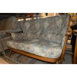 AN ERCOL GOLDEN DAWN FOUR PIECE LOUNGE SUITE comprising of two arm chairs, a two seater settee and a