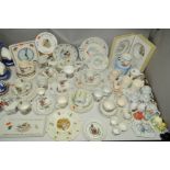 A COLLECTION OF MOSTLY WEDGWOOD PETER RABBIT TABLEWARES AND TRINKETS, to include boxed Nursery