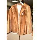 TWO LADIES BEIGE MINK AND HIP LENGTH JACKETS, one having feature scallop to the hem of the side-