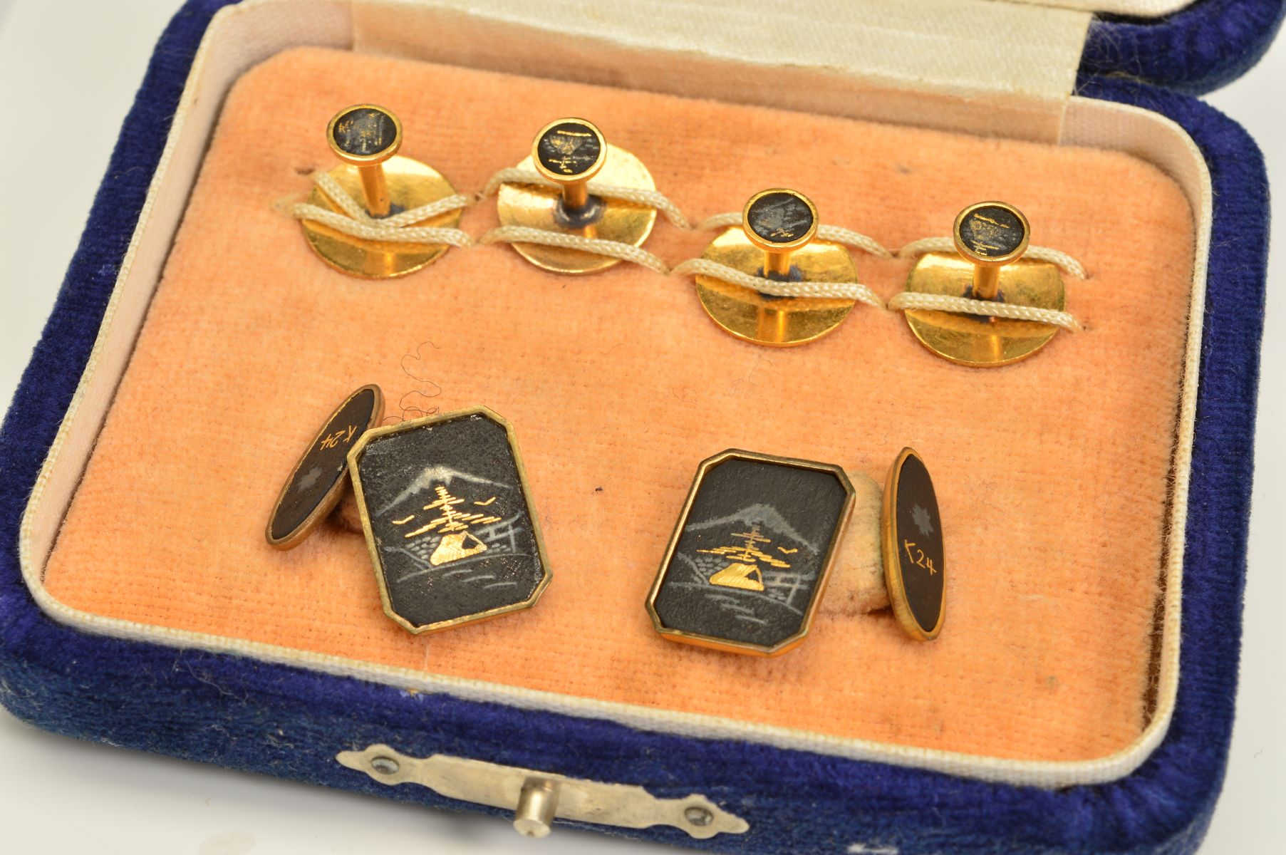A CASED SET OF DAMASCENE CUFFLINKS AND STUDS, to include four circular studs and a pair of chain