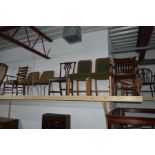 AN EARLY 20TH CENTURY OAK OFFICE ARMCHAIR together with a Chippendale style chair, two golden oak