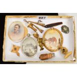 A SELECTION OF ITEMS, to include mother of pearl tape measure, two decorative watch keys, two seals,
