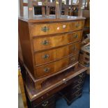 A MODERN MAHOGANY BOW FRONT CHEST OF FOUR LONG DRAWERS with swan neck brass handles on a shaped