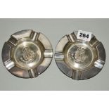 A PAIR OF GEORGE V SILVER ASHTRAYS, applied with King's Shropshire Light Infantry insignia,