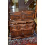 AN OLD CHARM OAK TWO DOOR TV CABINET together with matching hi fi unit with double cupboard doors (