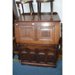 AN OLD CHARM OAK BUREAU in the form of a computer desk, width 84cm x depth 61cm x height 114cm