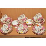 ROYAL ALBERT 'LADY CARLYLE' TEAWARES, comprising eleven cups (all seconds), twelve saucers (five