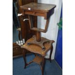 A DISTRESSED VICTORIAN WALNUT WORK TABLE with a single drawer together with an oak occasional