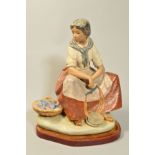 A LARGE LLADRO GRES FIGURE, 'Fisher Woman' with basket of fish and scales, No 2081, first issued