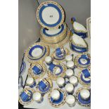 WEDGWOOD 'WHITEHALL' PATTERN PART DINNER SERVICE IN BLUE, ref W. 3993 including nineteen coffee cans