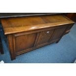 AN OAK TRIPLE PANEL BLANKET CHEST, width 110cm x depth 43cm x height 58cm