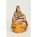 A CITRINE SWIVEL FOB, the faceted triangular citrine with a decorative acanthus leaf grip, height