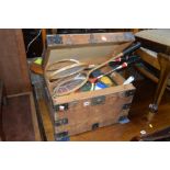 A SMALL VINTAGE PINE TRUNK with steel banding to corners, a brass lock assembly (no key) and