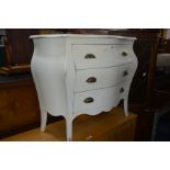 A PAINTED BOMBE COMMODE CHEST OF THREE DRAWERS, width 103cm x depth 42cm x height 85cm together with