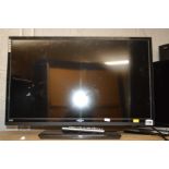 A BUSH 28'' LED TV (one remote)