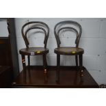 A PAIR OF CHILDS OAK BENTWOOD CHAIRS